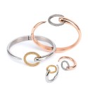 White Topaz Two-Tone Bangle Bracelet (1/5 ct. ) in Stainless Steel & 14k Rose Gold-Plated Stainless Steel PVD